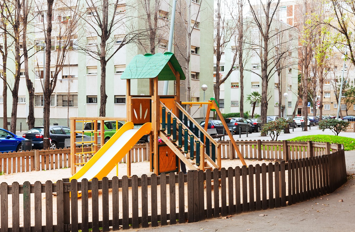 Wooden playground area in city yard